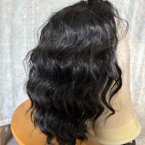 Black synthetic wavy lace front wig, 12 inches, semi-dense volume
EUC